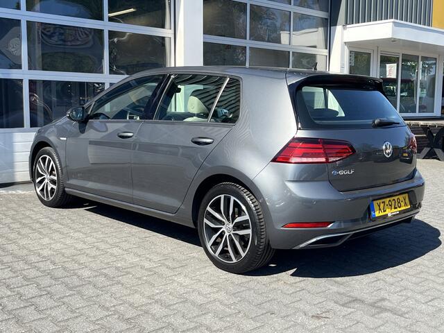 Volkswagen e-Golf 100% Elektrisch Airco Cruise controle Virtual display Navigatiesysteem Stuurwielbediening Telefoonverbinding Dynaudio Zwarte hemel Vol opties!! 230 km actieradius WLTP