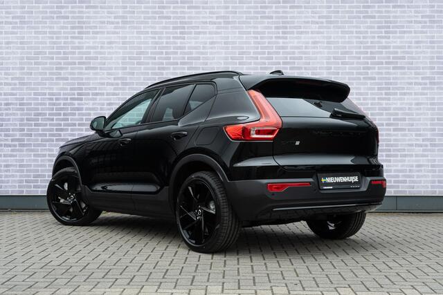 Volvo EX40 Black Edition Plus Extended Range | Op voorraad | Warmtepomp | 20" | Donker glas | Premium Audio