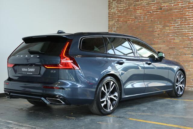 Volvo V60 B3 R-Design | Electrische bedienbare voorstoelen | Stoelverwarming | Adaptive Cruise Control | Parkeerverwarming | BLIS | Panoramadak | Parkeercamera | Parkeersensoren voor + achter | Semi Electrische Wegklapbare Trekhaak | Harman Kardon Premium Audio