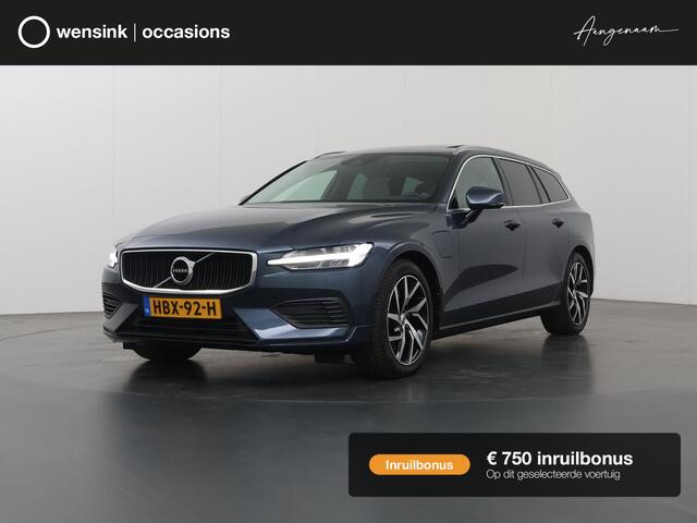 Volvo V60 2.0 T6 Recharge AWD R-Design | Panoramadak | Contourstoelen | HUD | Navigatie | Stoelverwarming | Camera | DAB | Apple CarPlay/Android Auto | Adaptieve Cruise Control | Harman/Kardon | Ele.verstelbare stoel + geheugen |