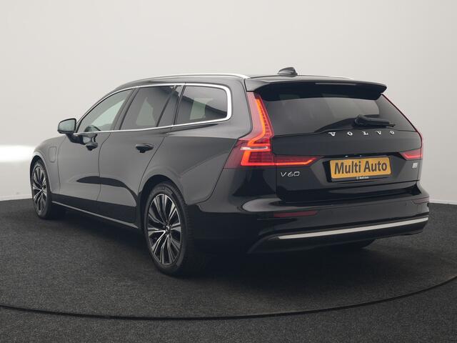 Volvo V60 T6 PHEV AWD Plus Bright 350pk Dealer O.H | Trekhaak Af Fabriek | Adaptive Cruise | Camera | Lederen Sportstoelen Memory & Verwarmd | Apple Carplay | Keyless | Google Assistant & Maps | Stuurverwarming | Pilot Assist | Virtual | Navigatie | DAB | 18"L.M | 