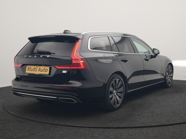 Volvo V60 T6 Recharge AWD Inscription PHEV 340pk Dealer O.H | Trekhaak Af Fabriek | Camera | Harman / Kardon | Lederen Sportstoelen Verwarmd | Cruise Control | Apple Carplay | Stuurverwarming | Keyless | Virtual | Navigatie | DAB | 18"L.M |