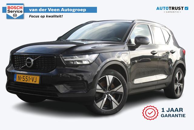 Volvo XC40 1.5 T4 Recharge R-Design | Incl. 12 maanden garantie | Harman/Kardon audio | Schuif/kantel dak | Apple carplay/Android auto | Stuurwiel verwarming | Voorstoelen verwarmd | DAB | Navigatie | Lichtmetalen velgen | Climate control | Zwart dakhemel