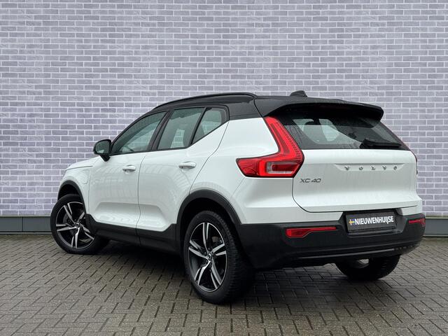 Volvo XC40 Plug-in Hybrid T5 R-Design | Adaptive cruise control | Harman Kardon audio | Stoel- en stuurverwarming | Elektrische stoelverstelling | Achteruitrijcamera | Voorruitverwarming | Parkeersensoren voor + achter | Dode hoek detectie BLIS |