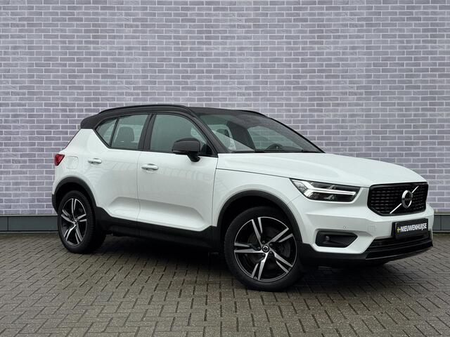 Volvo XC40 Plug-in Hybrid T5 R-Design | Adaptive cruise control | Harman Kardon audio | Stoel- en stuurverwarming | Elektrische stoelverstelling | Achteruitrijcamera | Voorruitverwarming | Parkeersensoren voor + achter | Dode hoek detectie BLIS |