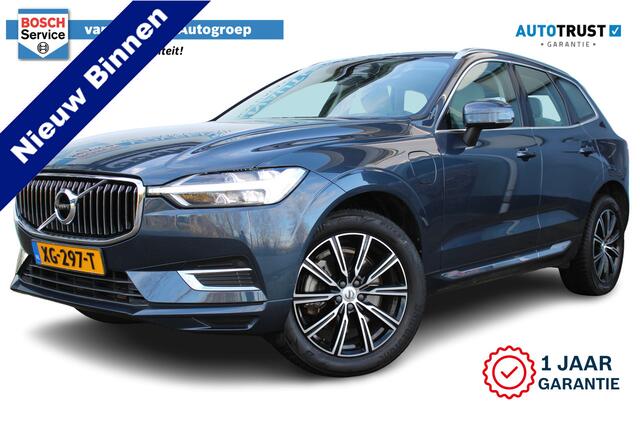 Volvo XC60 2.0 T8 Twin Engine AWD Inscription | Incl. 12 maanden Garantie | Panorama dak | Wegklapbare trekhaak | Adaptive Cruise | Apple CarPlay/Android Auto | Navigatie | Stoelverwarming | Climate controle | Parkeersensoren V+A | Elektrische kofferbak | Memory sto