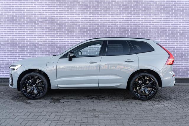 Volvo XC60 2.0 T6 Plug-in hybrid AWD Plus Dark | Longe Range | Google | Schuif-/Kanteldak | Memory | Harman Kardon Audio | Stoelverwarming Voor + Achter | Heico Uitlaatpakket | Keyless | Sportstoelen | Elektrische Achterklep | Stuurverwarming | Adaptieve Cruise | Do