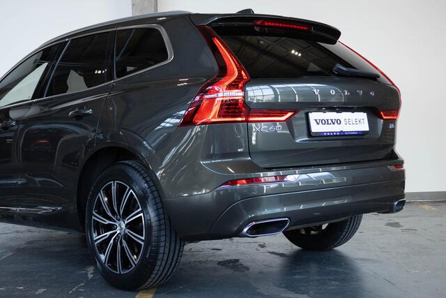 Volvo XC60 B5 Automaat Business Pro | Trekhaak | 360° parkeercamera | Adaptive cruise control | BLIS | Stoelverwarming | Stuurwielverwarming | Navigatie | Maroon lederen bekleding | Comfortstoelen |