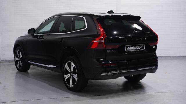 Volvo XC60 2.0 T8 Plug-in hybrid AWD Plus Bright NAP 1e eigen. ACC ECC led verlichting bestuurderstoel electrisch met memo draadlaas telefoonladen DAB Harman-Kardon Pano-dak trekhaak PDC camera 360