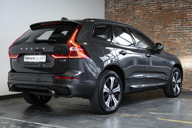 Volvo XC60 T6 Plug-in hybrid AWD Plus Dark | Trekhaak | Verwarmbare voorstoelen+stuurwiel+achterbank | Premium audio by Harman Kardon | Rondom zichtcamera | 19 inch lichtmetalen velgen | Google Infotainment |