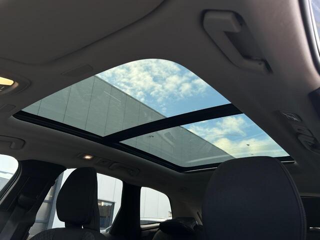 Volvo XC60 2.0 T6 Plug-in hybrid AWD Essential Edition Bright | Adaptieve Cruise Control | Heico Sierstukken | Panoramadak | Stoel en Stuurverwarming | Parkeercamera |