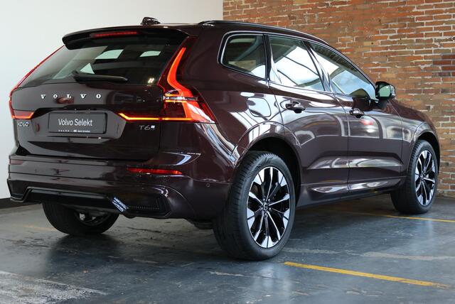 Volvo XC60 T6 Plug-in hybrid AWD Ultra Dark | Luchtvering | Semi-Electrische Wegklapbare Trekhaak | Stoelverwarming | Stuurwielverwarming | Harman Kardon Premium Audio | Google infotainment | 360° Parkeercamera | Parkeersensoren voor + achter
