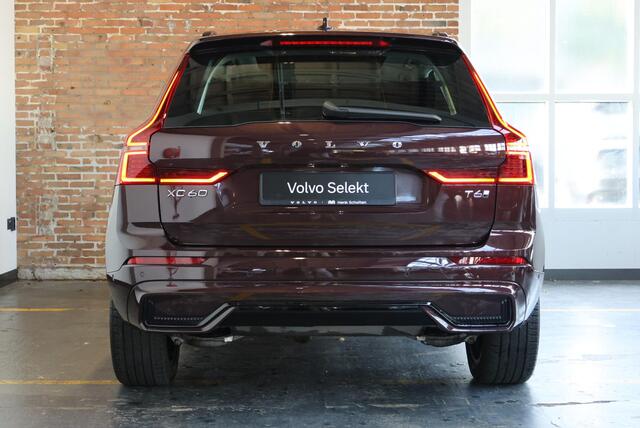 Volvo XC60 T6 Plug-in hybrid AWD Ultra Dark | Luchtvering | Semi-Electrische Wegklapbare Trekhaak | Stoelverwarming | Stuurwielverwarming | Harman Kardon Premium Audio | Google infotainment | 360° Parkeercamera | Parkeersensoren voor + achter