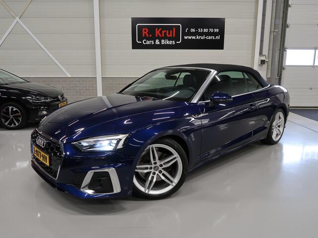 Audi A5 Cabriolet 40 TFSI Launch edition Sport S-Line Matrix Nekverwarming Trekhaak 3-Zone airco Digitaal dashboard Camera ACC Navigatie Automaat Alcantara Massagestoelen App connect 19 inch Sportvelgen Navarrablauw metallic Nieuwstaat