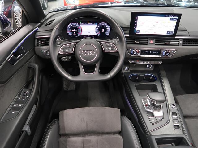 Audi A5 Cabriolet 40 TFSI Launch edition Sport S-Line Matrix Nekverwarming Trekhaak 3-Zone airco Digitaal dashboard Camera ACC Navigatie Automaat Alcantara Massagestoelen App connect 19 inch Sportvelgen Navarrablauw metallic Nieuwstaat