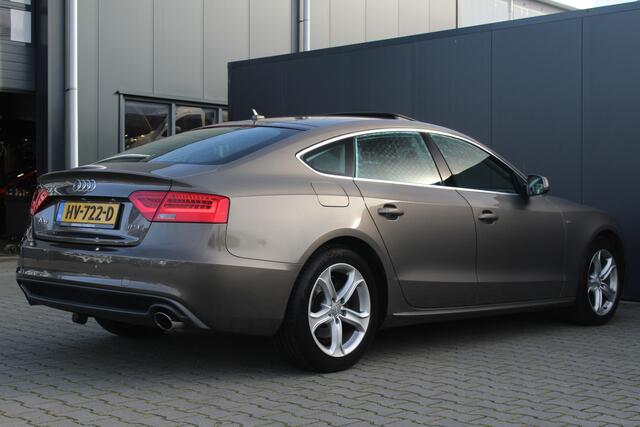 Audi A5 Sportback 1.8 TFSI Adrenalin | Incl. 12 maanden garantie | Trekhaak | Bang & Olufsen audio | Parkeersensoren | Bluetooth | Navigatie | Airco | Lichtmetalen velgen | Schuif/kantel dak | Cruise control
