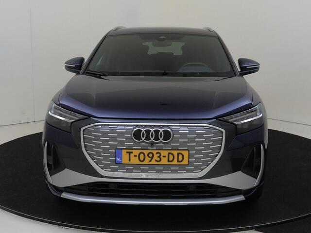 Audi Q4 e-tron 50 quattro S edition 77 kWh | Trekhaak | Head-up display | Lederen bekleding | Keyless | Dodehoek detectie | 3-zone airco | Parkeerasisstent | Adaptieve cruise control |