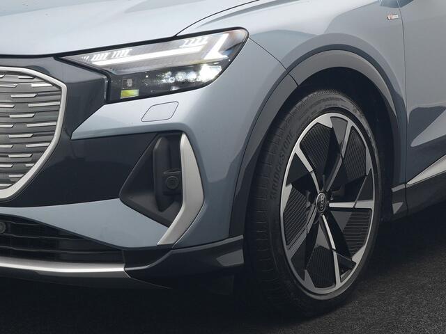 Audi Q4 e-tron 50 quattro S edition 77 kWh 299pk | Trekhaak Af Fabriek | Panodak | Adaptive Cruise | Head Up | Sonos Audio | Camera | Lederen Sportstoelen Memory & Verwarmd | Virtual | Navigatie | Keyless | 21"L.M |