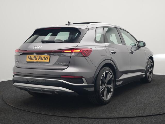 Audi Q4 e-tron 50 quattro S Line 77 kWh 299pk Dealer O.H. INCL BTW | Panodak | Lederen Sportstoelen Verwarmd | Keyless | Navigatie | Cruise Control | Virtual | DAB | Taifungrau Metallic |