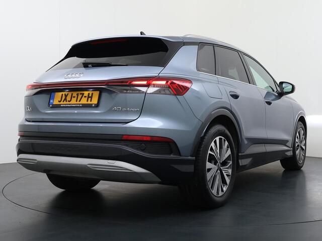 Audi Q4 e-tron 40 Launch edition Advanced Plus 77 kWh VAN ¤ 33.900,- VOOR ¤ 30.877,- UW LENTEVOORDEEL ¤ 3.023,-! | SOH 92% | S-LINE INTERIEUR | PANORAMADAK | STOELVERWARMING | ELEKTRISCHE ACHTERKLEP | LUXE BEKLEDING | RIJKLAAR MET 12 MND BOVAG GARANTIE