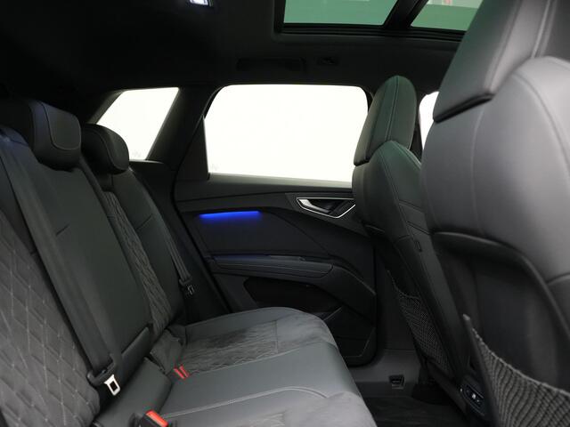 Audi Q4 e-tron 45 quattro 2x S Line 77 kWh 265pk Dealer O.H. | Panodak | Adaptive Cruise | Head Up | Camera | Sonos Sound | Alcantara Sportstoelen Verwarmd | Matrix LED | Sfeerverlichting | Keyless | Stuur Verwarmd | Apple Carplay | Blis | 21"L.M |