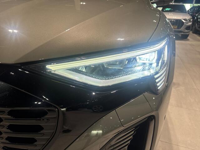 Audi Q8 Sportback e-tron 55 quattro S Edition 408pk / 115 kWh · Panoramadak · Bang & Olufsen sound · Stoel,-Stuur & achterbank verwarmd · Leder · 21'' Velgen · Apple/Android Car Play · Camera · Dodehoeksensoren· ·
