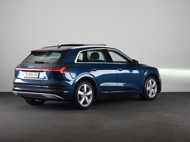 Audi e-tron 55 quattro Business edition Plus 95 kWh 408 pk | SOH 91% | Navigatie | Panoramadak | Parkeersensoren | Achteruitrijcamera | Lederen bekleding | Stoelverwarming |