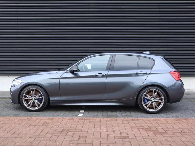 BMW 1-SERIE M140i Centennial Executive | Handbak | Clima | Cruise | Navi | Alcantara | M-Sport | PDC | LED | Multimedia |