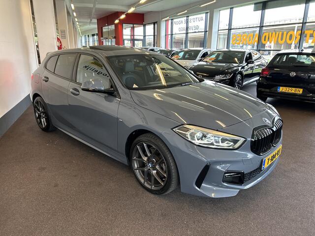 BMW 1-SERIE 118i M Sport | Panoramadak | Dealer onderhouden | Nederlands geleverd | Achteruitrijcamera | Digital dashboard | Cruise control | Climate control | Elek. inklapbare spiegels | Adaptief onderstel