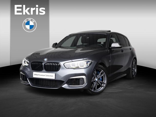 BMW 1-SERIE M140i | High Executive | Akrapovic | Harman-Kardon | Stuurwielrand verwarmd | Achteruitrijcamera | Schuif-/kanteldak | Stoelverwarming