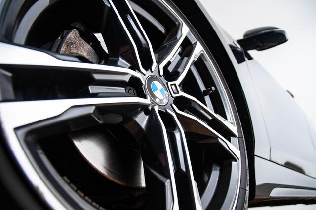 BMW 1-SERIE 118i High Executive M Sport - Sportstoelen - Stoelverwarming - PDC Voor/Achter - Cruise control - Getinte Ruiten - High Beam Assistant - Multifunctioneel stuurwiel - Elektrische verstelbare lendensteunen -