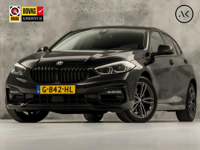 BMW 1-SERIE 118i Sport Automaat (APPLE CARPLAY, GROOT NAVI, LEDER, CAMERA, SPORTSTOELEN, SFEERVERLICHTING, CRUISE, NIEUWSTAAT)