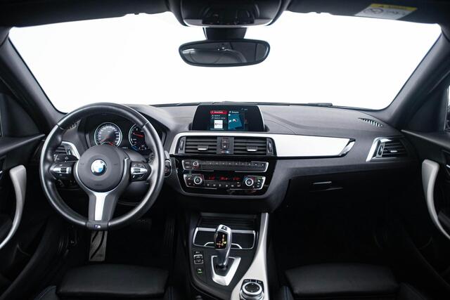BMW 1-SERIE 118i Edition M Sport Shadow High Executive Middenarmsteun - PDC Voor/achter - Cruise Control - Sportstoelen - Elektrisch verstelbare lendensteunen - Elektrisch verwarmde voorstoelen - Navigatiesysteem Business -
