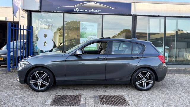 BMW 1-SERIE 118i Centennial High Executive | AUTOMAAT | PANODAK | LEER