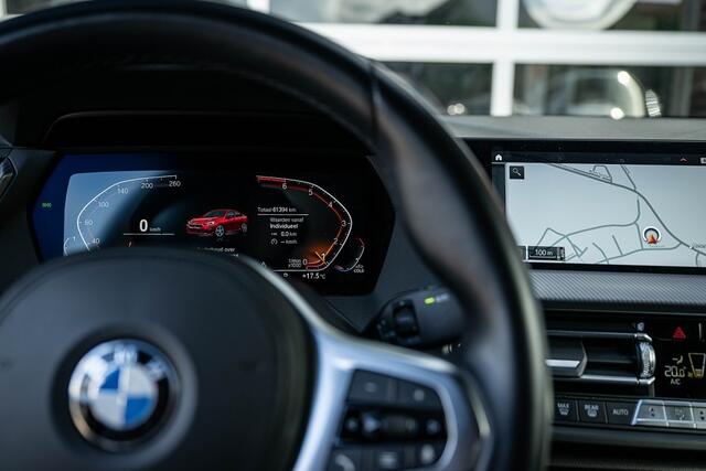 BMW 2-SERIE 218 218i | M-Sport | Cruise | Sportstoelen | Active Guard Plus | 18' inch | NAP |