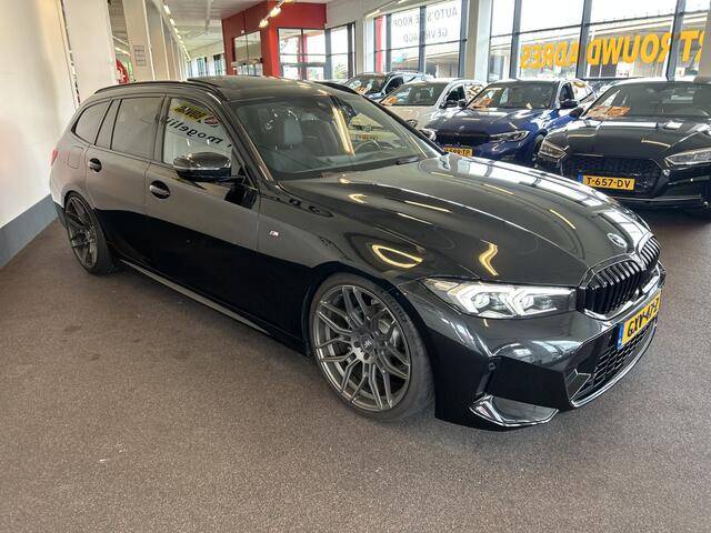 BMW 3-SERIE Touring 318i M Sport | Panoramadak | Fabrieksgarantie | 20''INCH | Verlaagd | Lederen bekleding | Afneembare trekhaak | Cruise control | Climate control | Lane assist | Apple carplay | Full LED