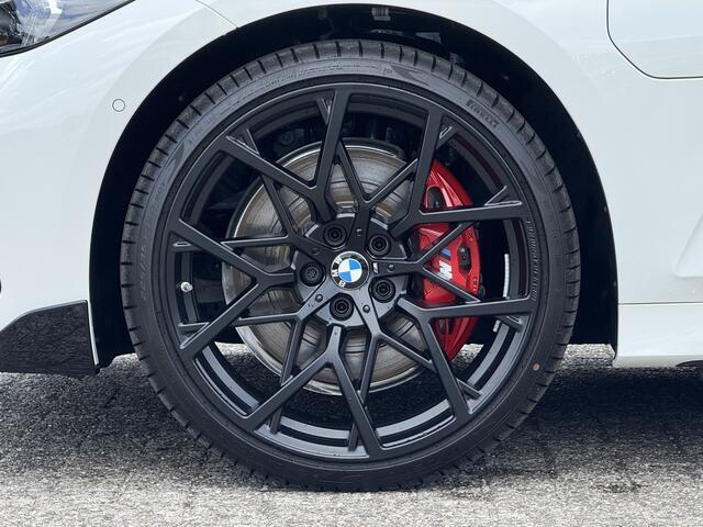 BMW 3-SERIE Touring 330e | M-Sport Pro | M-Performance | 20'' | Camera | Getint Glas | HiFi