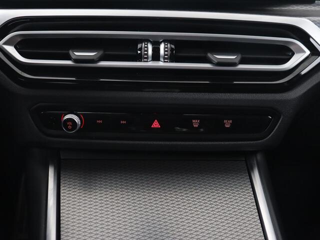 BMW 3-SERIE Touring 330e Business Edition Plus | Wegklapbare trekhaak | Camera | Stoel & Stuurverwarming | Carplay | Leder