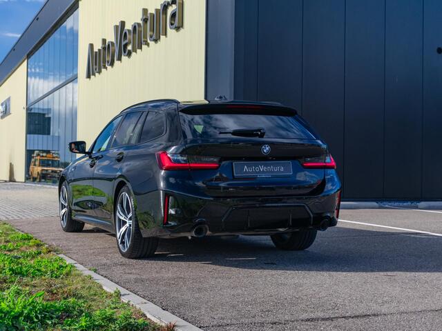 BMW 3-SERIE Touring 330e Trekhaak | Schuif-/kantel dak | Adapt. Cruise | Stoelverwarming | Harman Kardon | 360 Camera