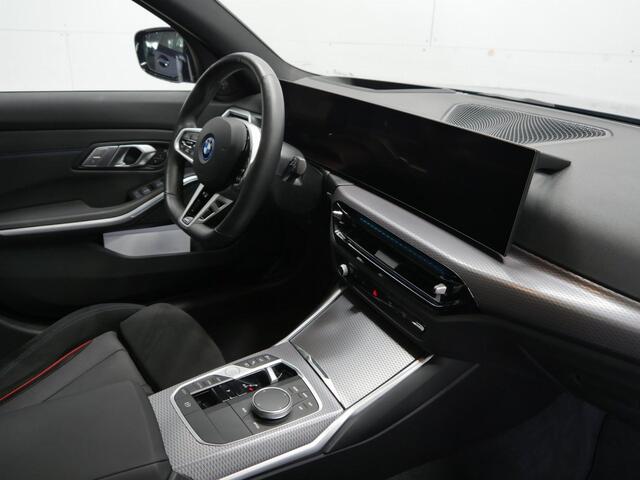 BMW 3-SERIE Touring 330e M-Sport Pro | Trekhaak | 19" | Panorama | Memory | Driving Assistant Professional | Harman Kardon
