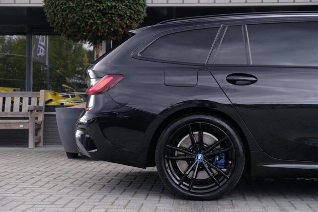 BMW 3-SERIE Touring 330e M Sport Shadow HUD LASERLED PANODAK TREKHAAK CARBON Gratis onderhoud T/M 2027