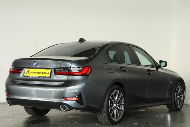 BMW 3-SERIE 320e High Executive / LED / Navi / CarPlay / Leder / DAB