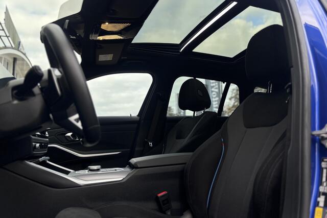 BMW 3-SERIE Touring 330e M-Sport | 19,5 kWh | Panodak | Head-Up | Memory | Trekhaak | 360° Camera | Fabrieksgarantie