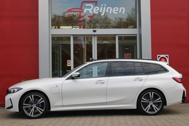 BMW 3-SERIE Touring 330e 292PK M-SPORT | M-SPORT PRO-PAKKET | M-SPORT REMMEN UITGEVOERD IN DONKERBLAUW MET M LOGO | BMW LIVE COCKPIT PROFESSIONAL | CURVED DISPLAY |DRIVING ASSISTANT INCL. HEAD-UP DISPLAY | PANORAMISCH SCHUIF/KANTEL DAK | PARKING ASSIST INCL. ACHTERUI