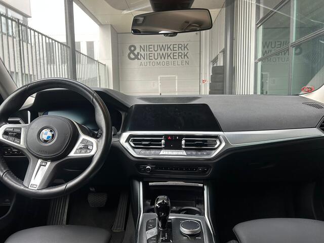 BMW 3-SERIE Touring 320i Business Edition Plus | AUTOMAAT | TREKHAAK | CARPLAY/ANDROID | CAMERA | STOEL/STUURVERWARMING | NAVI | CRUISE CONTROL | CLIMATE CONTROL | PDC V+A | LMV 18'' | ELEKTR. ACHTERKLEP | BLUETOOTH