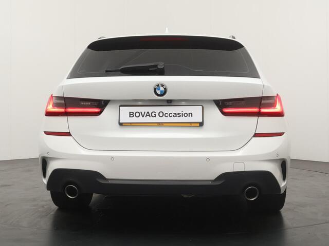 BMW 3-SERIE Touring 320i High Executive Edition | Stoelverwarming | Achteruitrijcamera | Trekhaak |