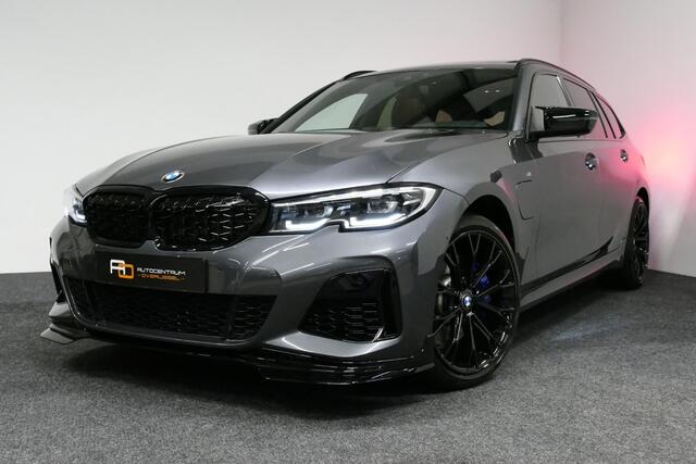 BMW 3-SERIE Touring 330e xDrive M Sport / M340i Diffuser / Black Diamond M Grill / M340i M Sport bumper pakket / Schuif-/kanteldak / Elektr. verstelbare voorstoelen (links met memory) / Stoelverwarming / Apple Carplay - Android Auto / Achteruitrijcamera / Trekhaak (z