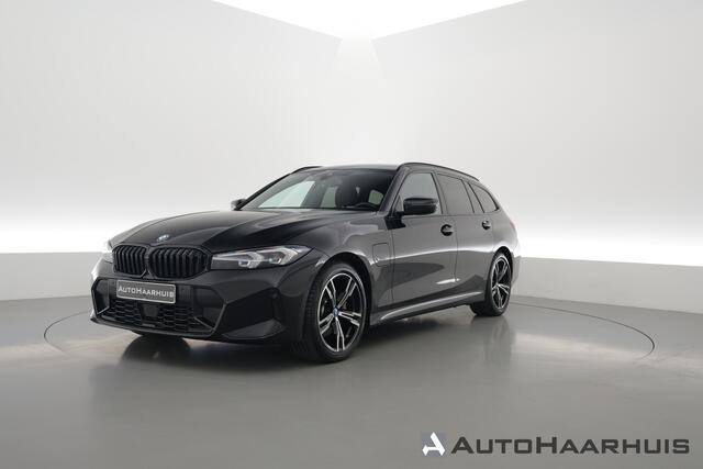 BMW 3-SERIE Touring 320e M Sport | Facelift | Shadow Line | Curved display | Adapt. Cruise | Nav + CarPlay | Elek. Klep | Sfeerverlichting | LED | Stoelverw. | PDC V