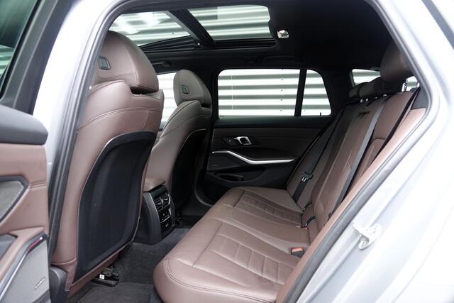 BMW 3-SERIE Touring M340d xDrive M-Sport | Pano | H&K | Memory | Trekhaak | 360 | HUD |