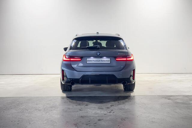BMW 3-SERIE Touring 320e M Sportpakket Aut.